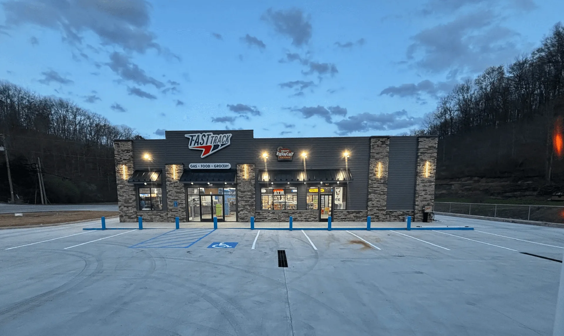 Accessible parking spaces and line markings outside a convenience store